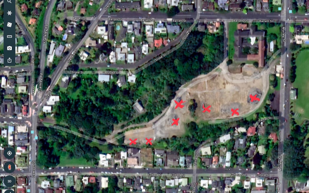 Ariel view of the former Barrett Street Hospital site in New Plymouth with piles of asbestos and lead contaminated soil marked.