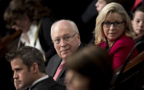 Former US Vice President Dick Cheney (C) sits with his daughter US Congresswoman Liz Cheney (R), R-Wyoming, during the opening of the 115th US Congress on Capitol Hill in Washington, DC, January 3, 2017. (Photo by JIM WATSON / AFP)