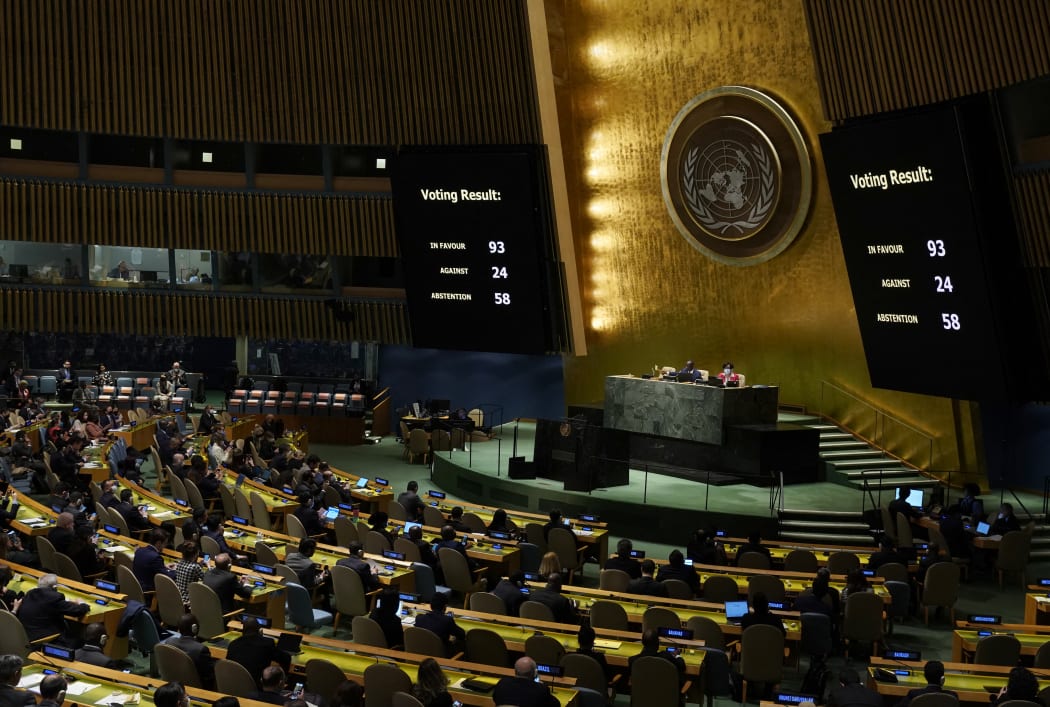 The board showing the passage of the resolution during a UN General Assembly vote on a draft resolution seeking to suspend Russia from the UN Human Rights Council in New York City on 7 April 2022.