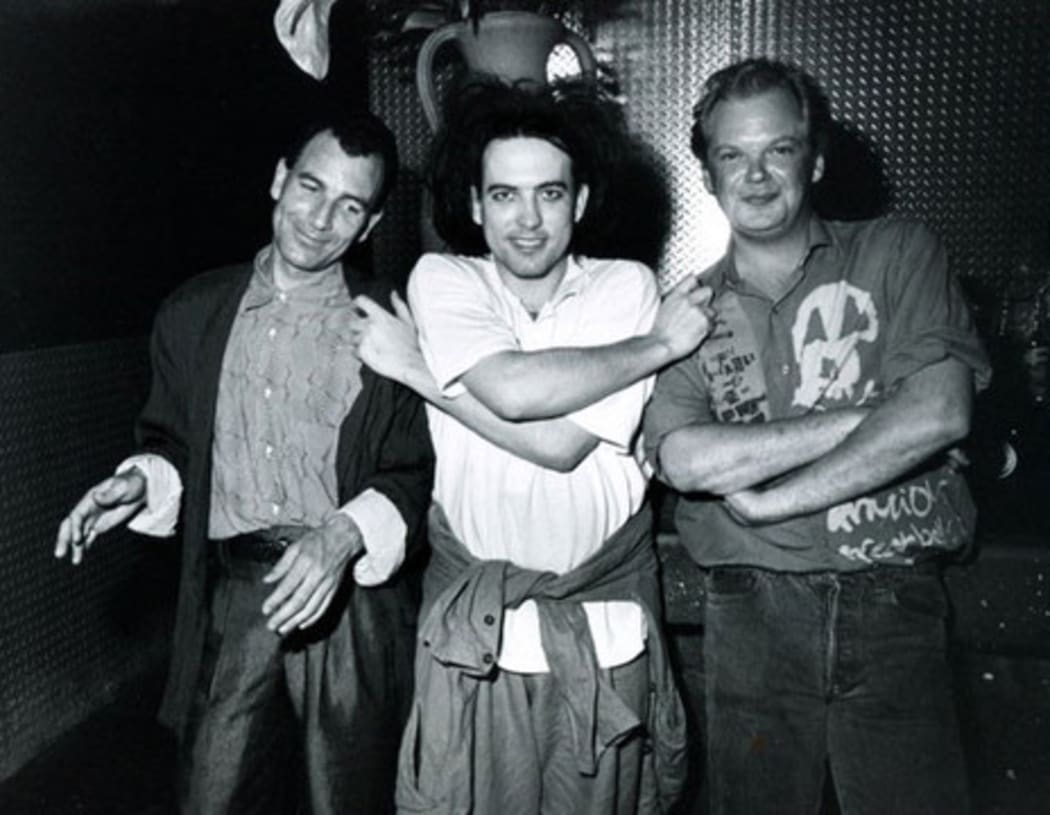 Chris Parry, The Cure's Robert Smith and US Elektra East Coast Head of A&R, Howard Thompson.