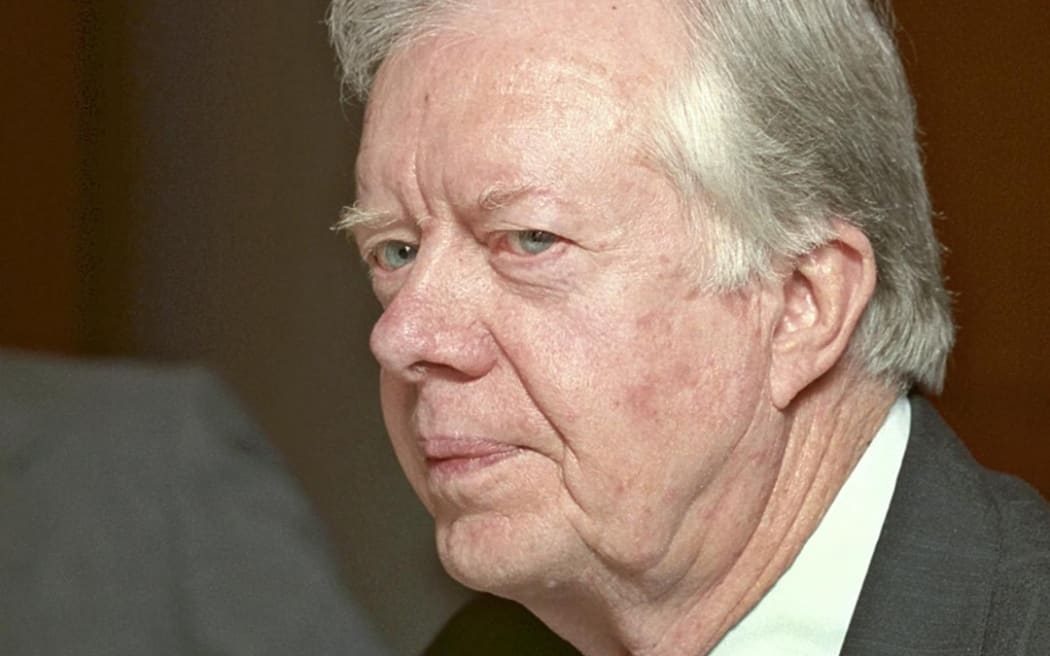 [FILE] Jimmy Carter, the former United States President, attends a press conference at the US Embassy in Tokyo, Japan, on July 3, 1994. He spoke to the media about his talk with Kim Il-Sung, the Supreme Leader of North Korea, a month before. ( The Yomiuri Shimbun ) (Photo by YOMIURI SHIMBUN / Yomiuri / The Yomiuri Shimbun via AFP)
