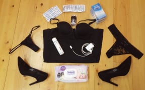 A picture of some of the tools of Megan's trade, including condoms, lubricant and underwear.