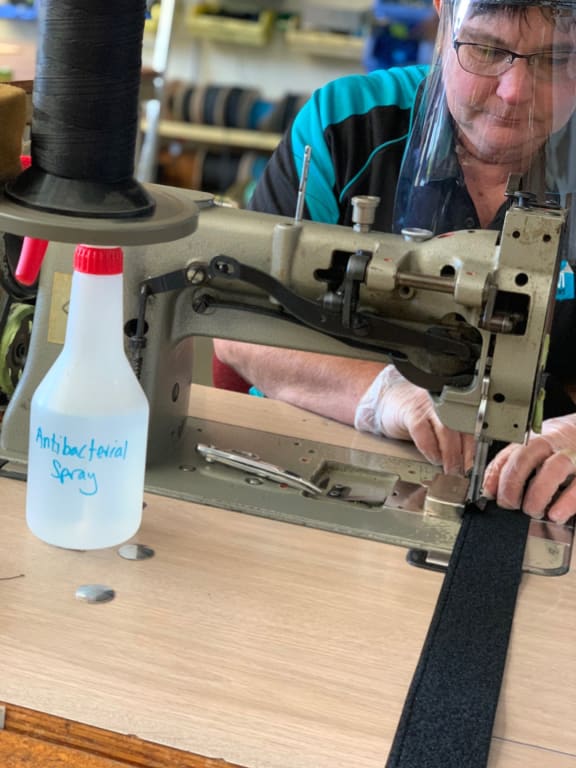 Transport and Marine Covers staff are making almost 400 PVC face shields daily.