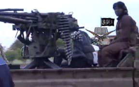 A screengrab from a video released by Nigerian Islamist extremist group Boko Haram.