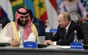 Saudi Arabia Crown Prince Mohammed bin Salman (L) and Russia's President Vladimir Putin attend the G20 Leaders' Summit in Buenos Aires, on November 30, 2018.