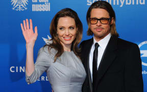 Angelina Jolie and Brad Pitt at a charity event Cinema for Peace, Berlin, 2012.