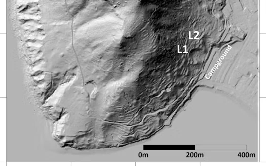A high-resolution elevation map of Mauao and surrounding land at Mount Maunganui, drawn from Land Information New Zealand data, showing landslide features. Two ancient landslides, or paleolandslides, above the campground site are labelled L1 and L2.