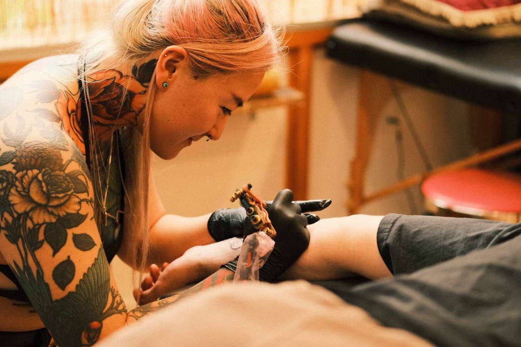 Wellington Tattoist Rose Hu in action