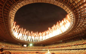A photo shows  fireworks during the Opening Ceremony of Tokyo 2020 Olympic Games at National Stadium in Tokyo on July 23, 2021. The summer Olympic games will run until Aug. 8th.  (