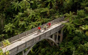 Cyclists on the Mountains to Sea - Ngā Ara Tūhono Great Ride, crossing the Bridge To Nowhere.