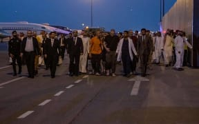 Prisoners of war arriving from Russia, at the airport of the Saudi capital Riyadh, on September 21, 2022.