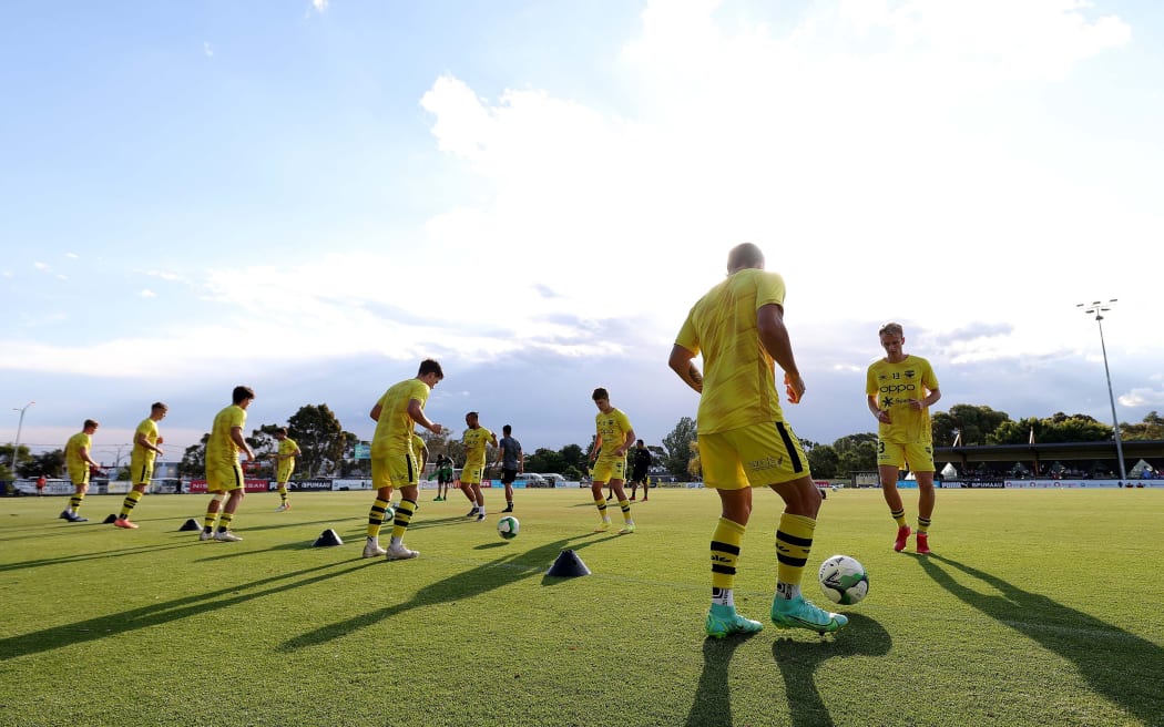 Wellington Phoenix players warm up at Kingston Heath Soccer Complex, Melbourne