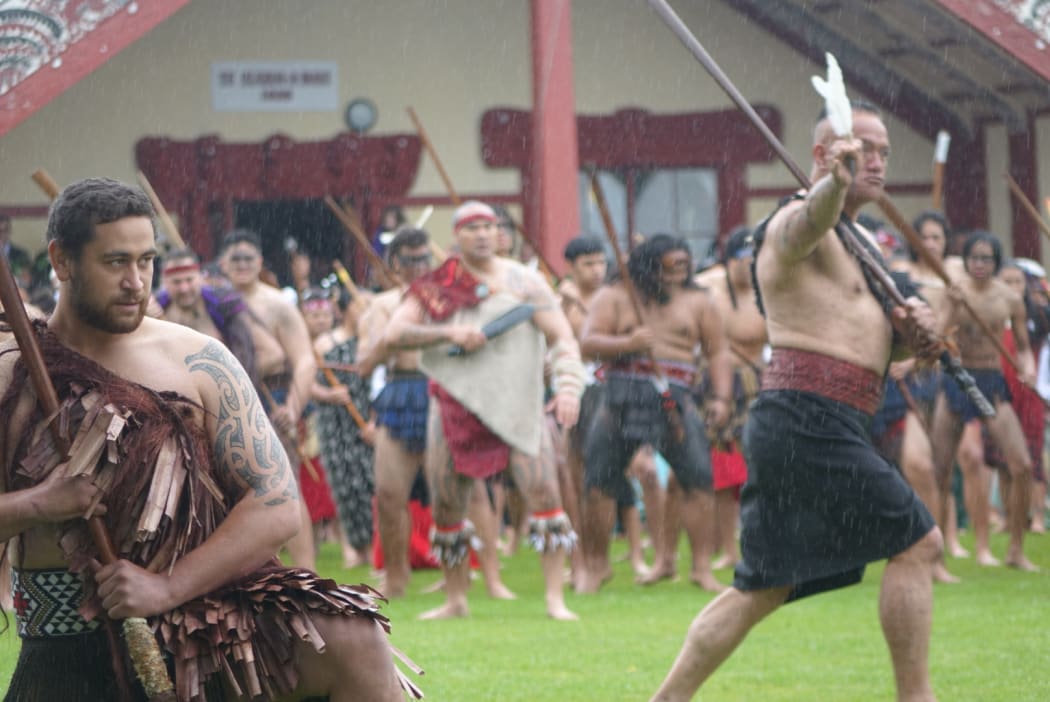 Hundreds of Māori toa, warriors, welcome officials on Owae Marae in Waitara for the commemorations of the New Zealand Land Wars.