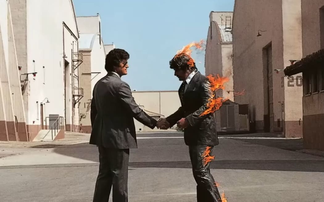 Pink Floyd's Wish You Were Here album cover designed by Hipgnosis.