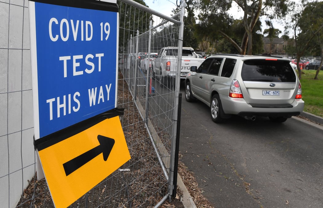 People queue in their cars at a Covid-19 testing station in Melbourne on May 25, 2021, as the city recorded five new locally-acquired coronavirus cases in the community after an 85-day unbroken stretch of zero infections.