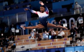 TOKYO, JAPAN - AUGUST 03: Simone Biles of Team United States warms up prior to the Women's Balance Beam Final on day eleven of the Tokyo 2020 Olympic Games at Ariake Gymnastics Centre on August 03, 2021 in Tokyo, Japan. (Photo by Amin JAMALI/ATP Images)