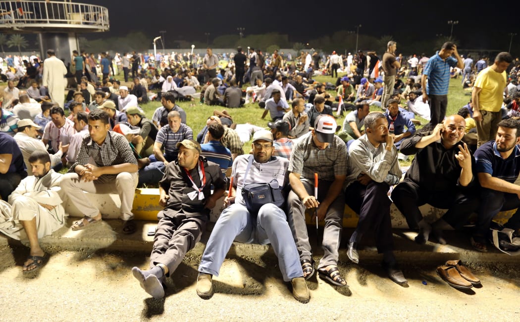 Supporters of Shiite cleric Muqtada al-Sadr gather at Grand Festivities Square in Baghdad's Green Zone.