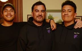 Vaitoa Mallon (far right) explains how he stays connected to his Kiribati roots. Pictured alongside his brother Manoa Teaiwa and father Sean Mallon (centre).