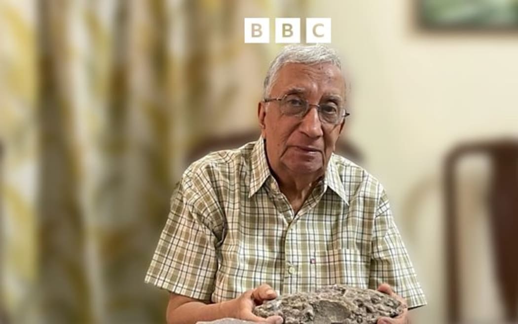 Ashok Sahni at home with fossilised dinosaur eggs