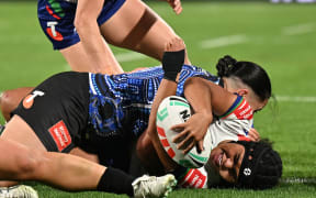 Patricia Maliepo of the Warriors scores a try.