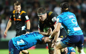 Chiefs captain Brodie Retallick goes on the charge against the Blues.