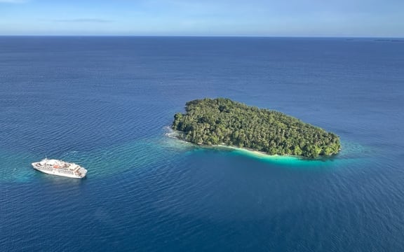 The Coral Adventurer ran aground off the coast of Papua New Guinea on Saturday.