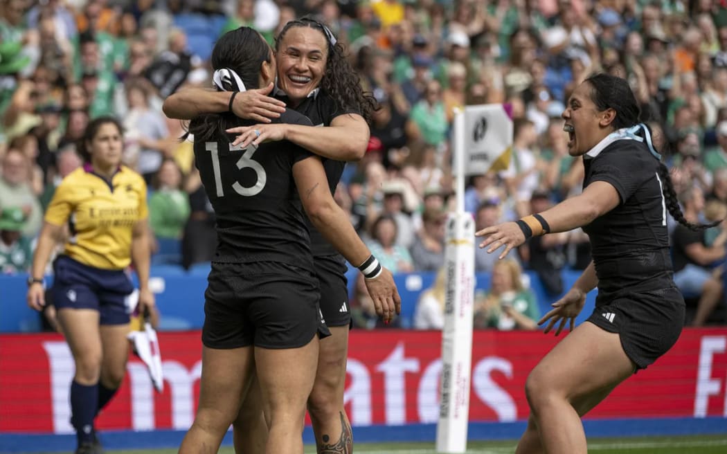 Portia Woodman-Wickliffe embraces Stacey Waaka after the centre scored.
