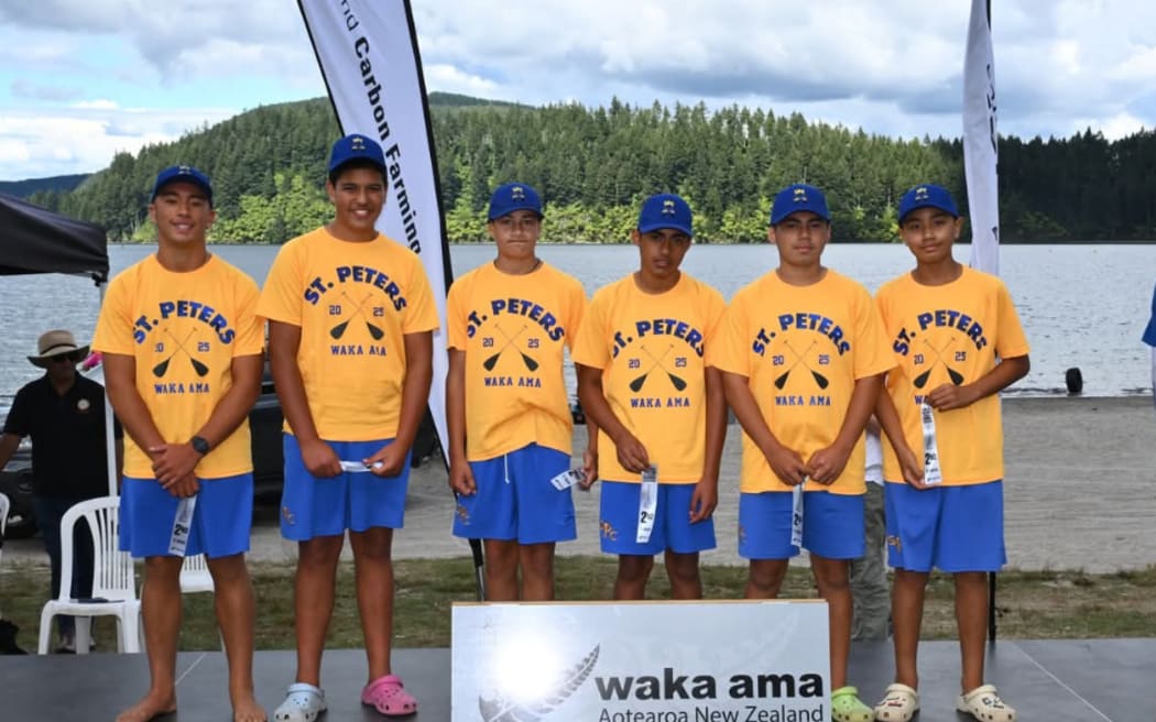 From left: Lochlan Sa’olotoga Te’o with his St Peter's Waka Ama team.