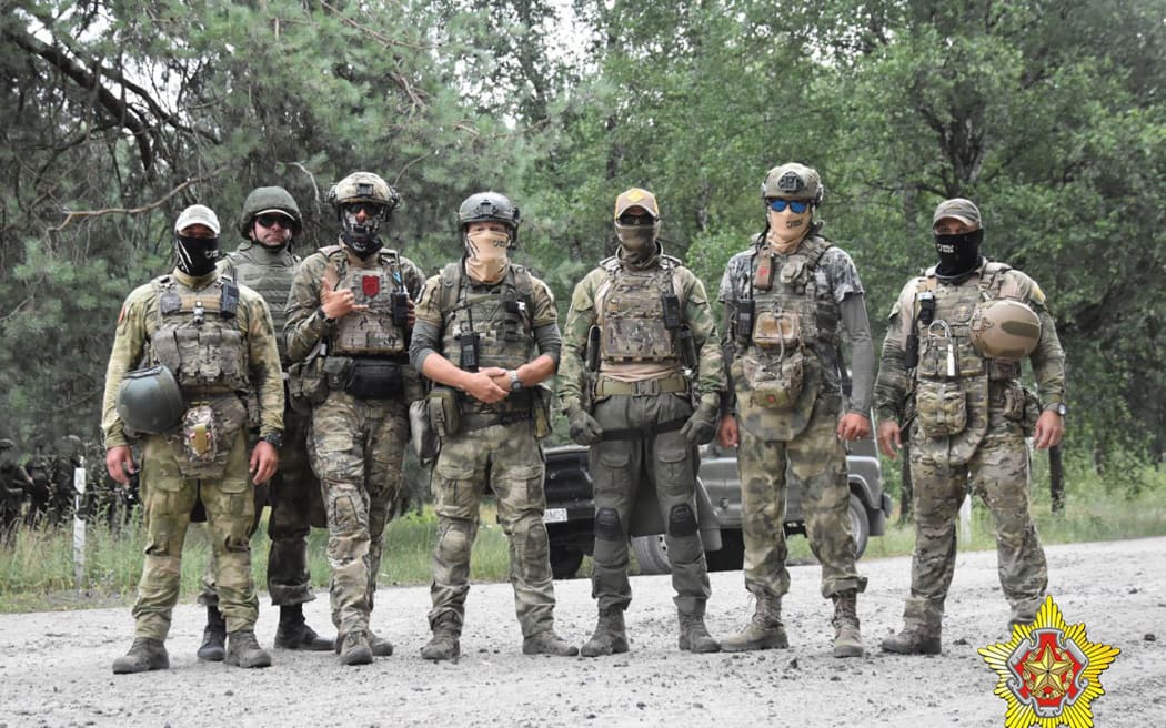This handout picture posted on July 20, 2023 on the Telegram channel of the Belarusian Defence Ministry shows what is said a joint training of PMC Wagner fighters with Belarusian special forces servicemen at the Brestsky military ground. Belarus said on July 20, 2023 that instructors from mercenary force Wagner have begun training the ex-Soviet country's special forces, nearly a month after an aborted rebellion in Russia. Wagner, which played a key role in the Ukraine offensive, sought to topple Russia's military leadership during its brief rebellion last month, before backing down.
Belarusian strongman Alexander Lukashenko offered Wagner chief Yevgeny Prigozhin refuge in Belarus and said his army would benefit from the combat experience of Wagner commanders. (Photo by Handout / TELEGRAM / @modmilby / AFP) / RESTRICTED TO EDITORIAL USE - MANDATORY CREDIT "AFP PHOTO / TELEGRAM /...