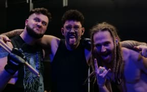 Māori heavy metal band Alien Weaponry (left to right Henry Te Reiwhati de Jong, Tūranga Morgan-Edmonds and Lewis Raharuhi de Jong) in the 2025 documentary Alien Weaponry: Kua Tupu Te Ara