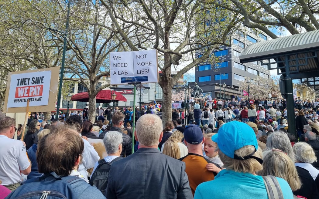 An estimated 35,000 people are protesting against possible cuts to the long-awaited new Dunedin Hospital.