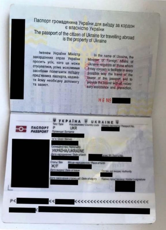 A Ukrainian passport, with some information redacted, is seen in this undated picture released by Democrats on the House Oversight Committee on Thursday, 18 December.