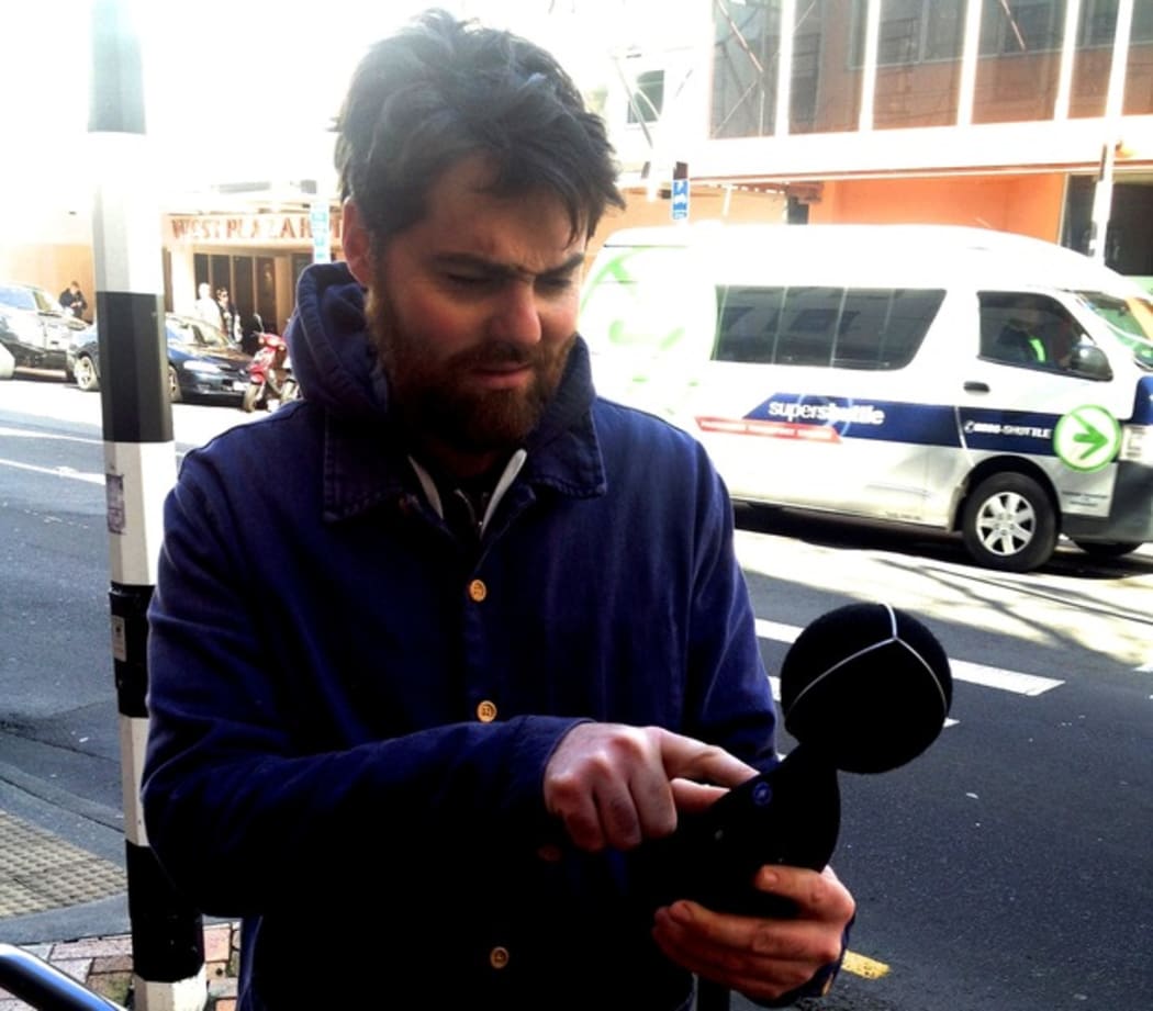 Samuel Scott checks the noise level.