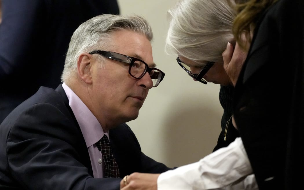SANTA FE, NEW MEXICO - JULY 10: Actor Alec Baldwin speaks with sister Elizabeth Keuchler during his hearing at Santa Fe County District Court on July 10, 2024 in Santa Fe, New Mexico. Baldwin is facing a single charge of involuntary manslaughter in the death of cinematographer Halyna Hutchins on the set of the film "Rust".   Ross D. Franklin - Pool/Getty Images/AFP (Photo by POOL / GETTY IMAGES NORTH AMERICA / Getty Images via AFP)