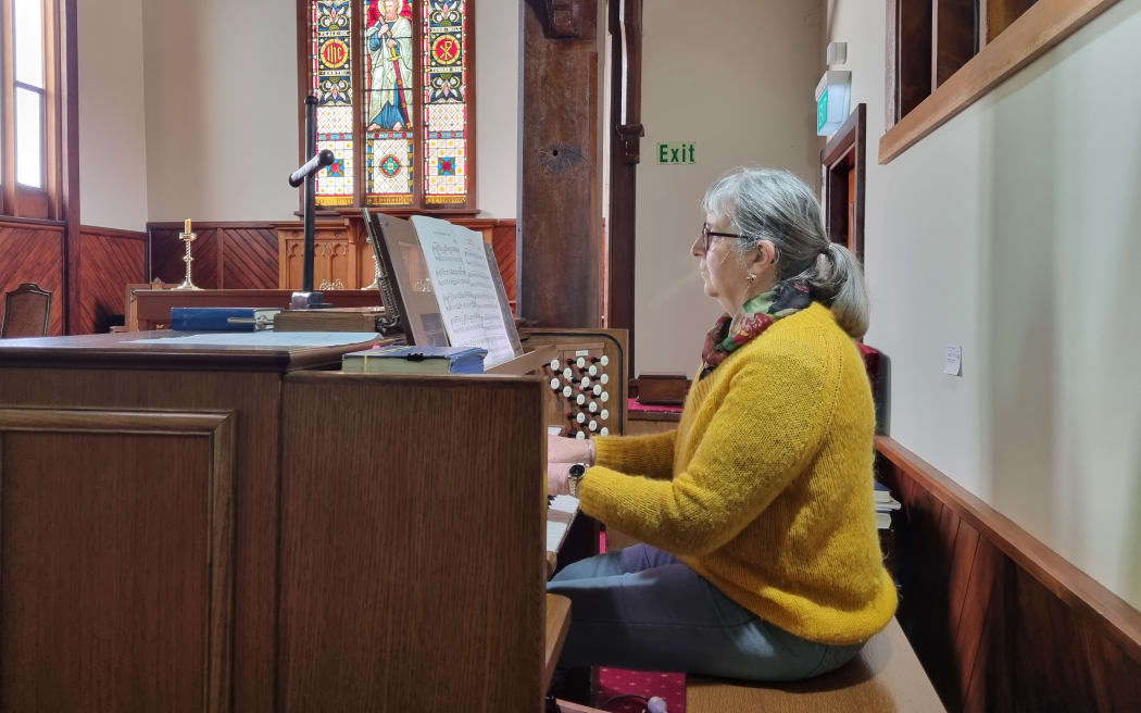 Saint Paul's Papanui warden Jennifer Barry plays organ.