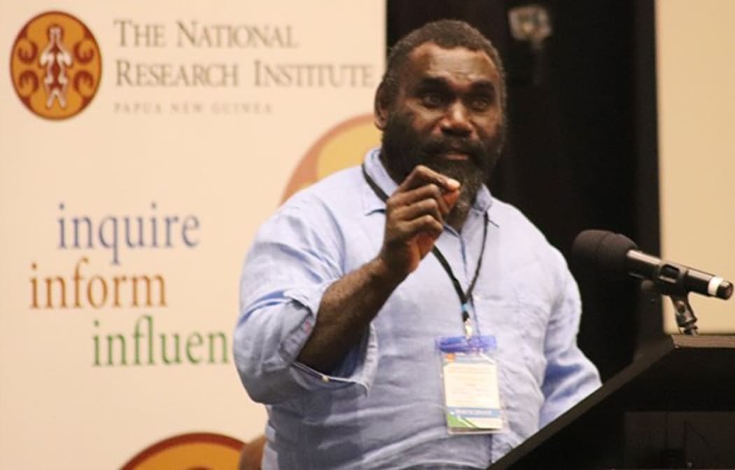 Ishmael Toroama speaking at PNG think-tank, The National Research Institute.