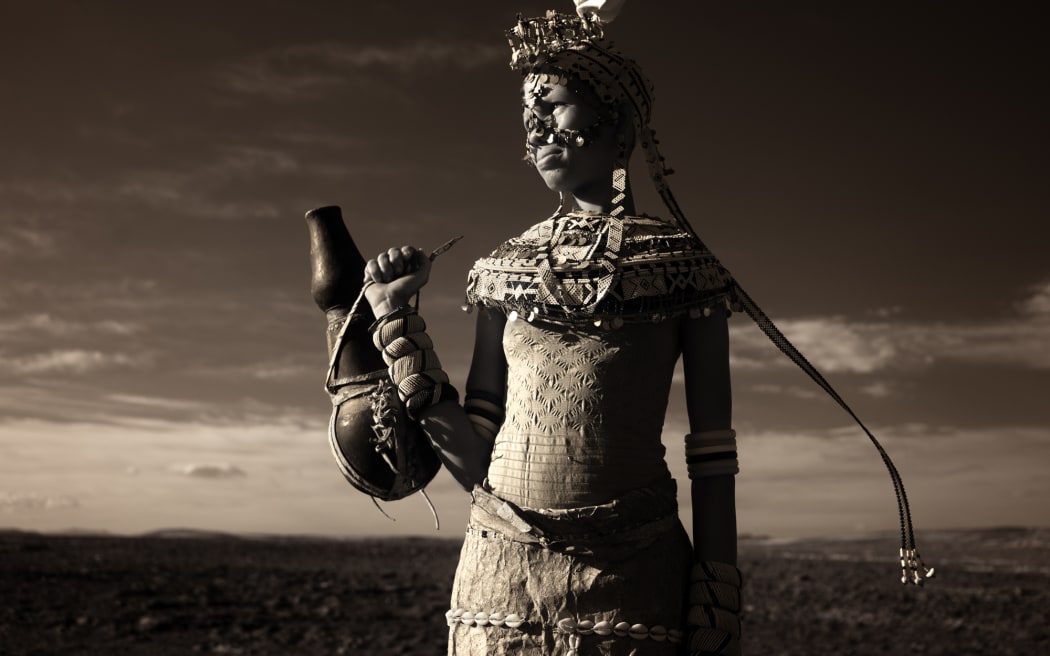 A Rendile girl, adorned in elaborate traditional attire, Northern Kenya.