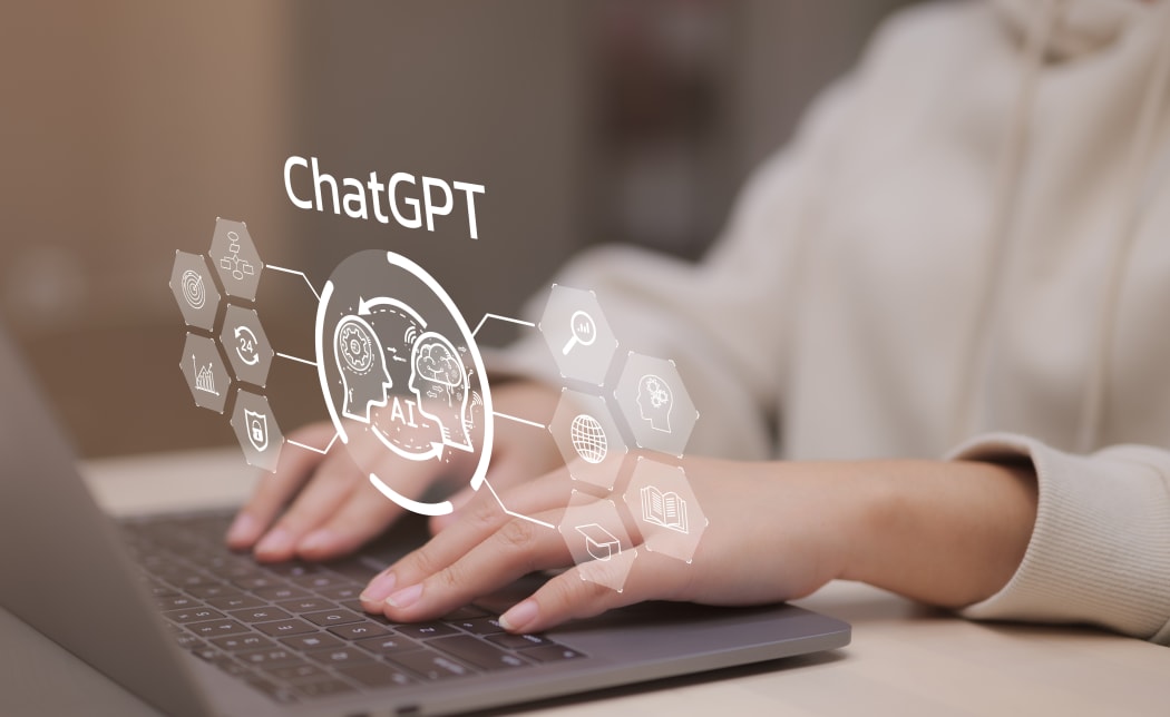 ChatGPT Chat with AI or Artificial Intelligence technology. Woman using computer chatting with an intelligent artificial intelligence asks for the answers wants. knowledge on the internet, e-learning,