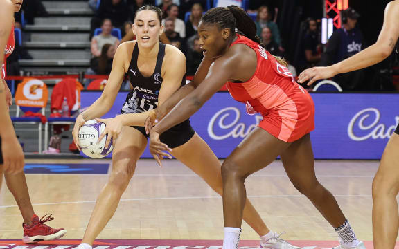 Silver Ferns Amelia Walmsley (L) with England's Halimat Adio