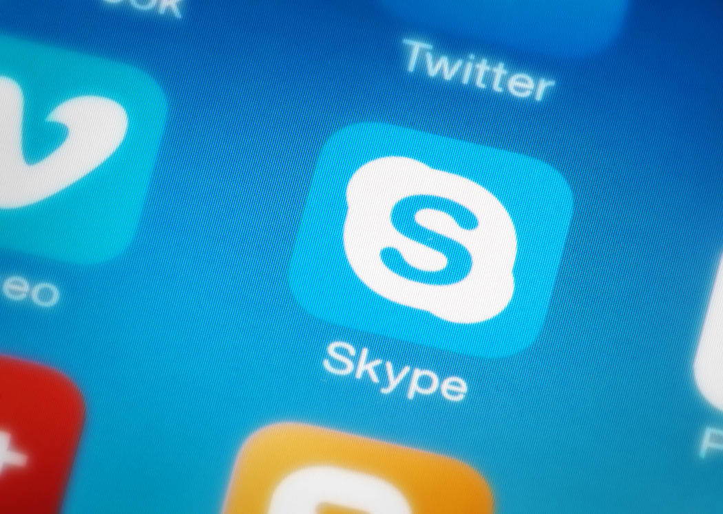 A Skype application icon on a mobile phone - next to Twitter and Vimeo.
