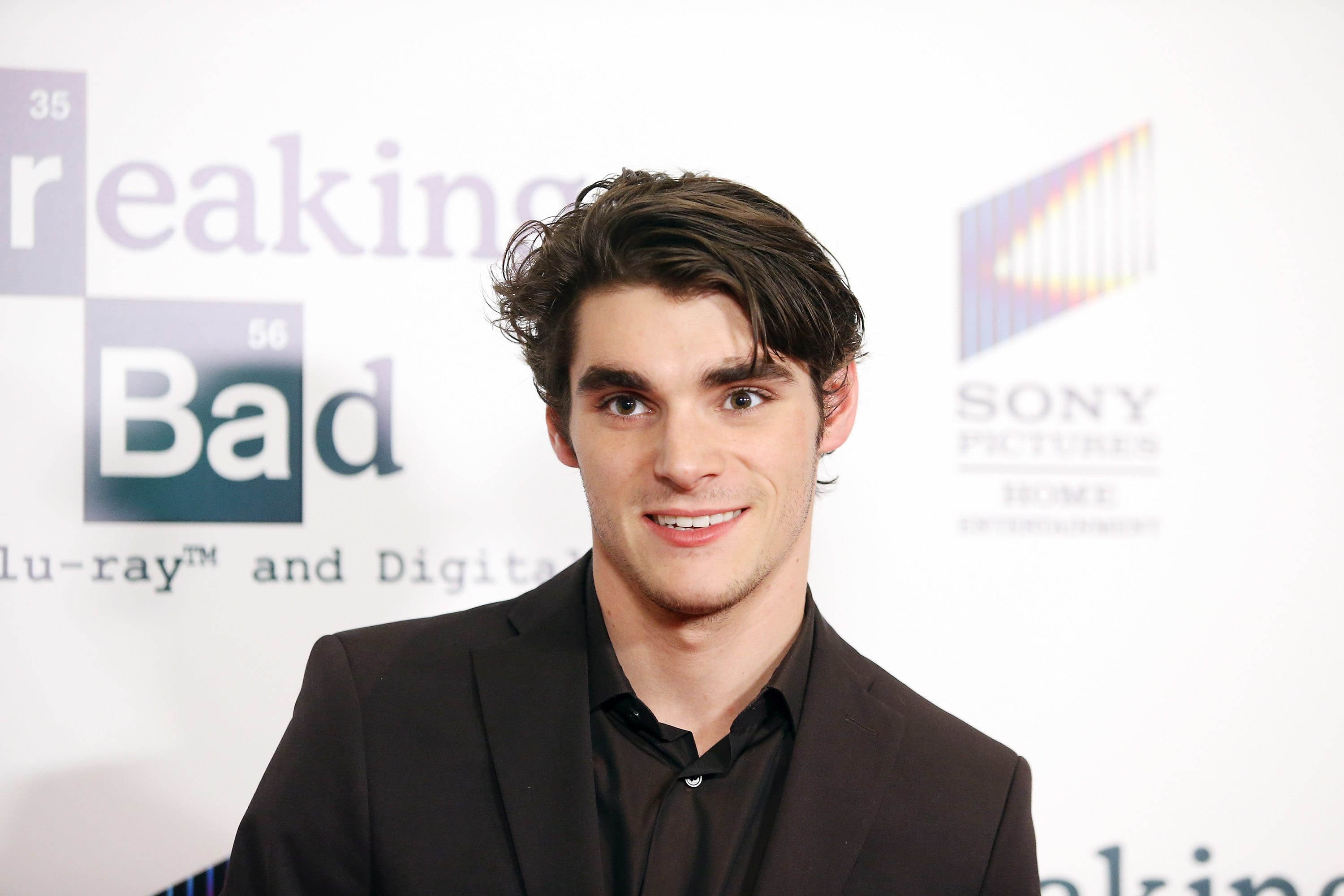 LOS ANGELES, CA - NOVEMBER 25: RJ Mitte attends the "No Half Measures: Creating The Final Season Of Breaking Bad" DVD launch held at Pacific Theatre at The Grove on November 25, 2013 in Los Angeles, California. (Photo by Michael Tran/FilmMagic)