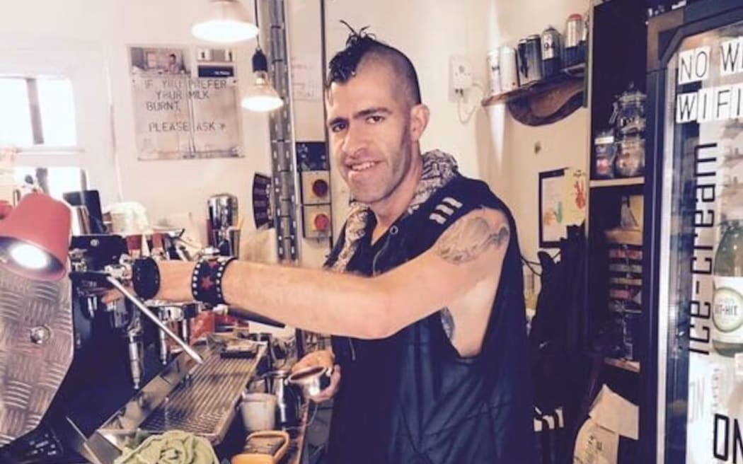 Joel Buckley pictured working in the coffee shop he owned several years before his death.