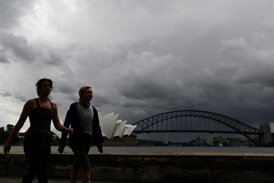 Residents exercise along Sydney Harbour