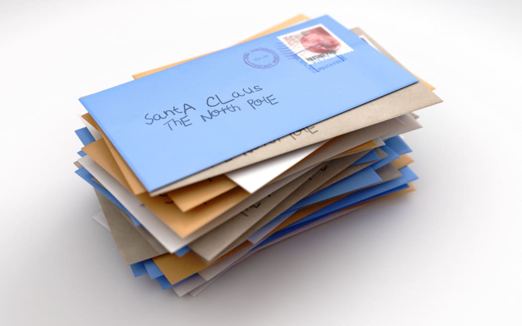 A stack of childrens wish list letters addressed to santa clause in the north pole on an isolated white studio background - 3D render
