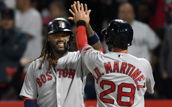 Red Sox players celebrate.