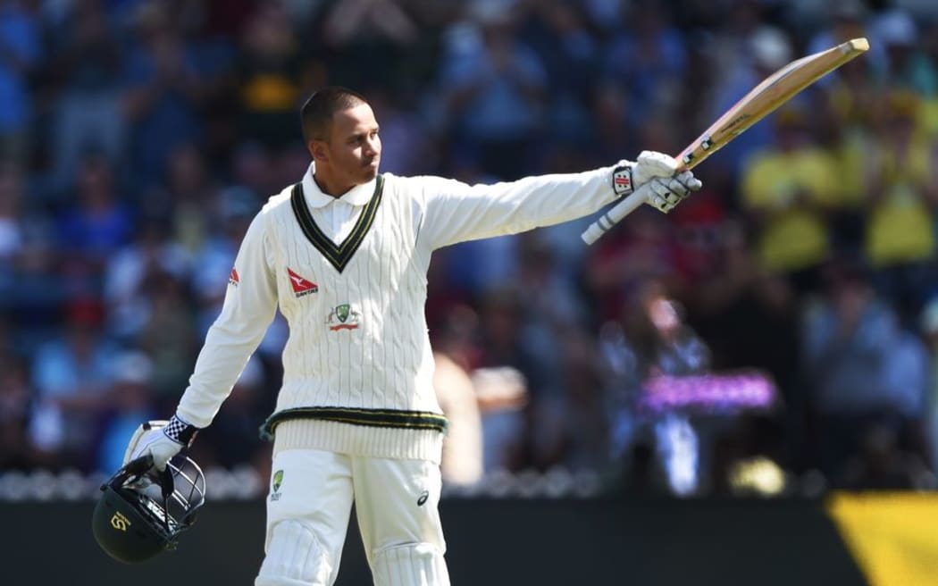 Australian batsman Usman Khawaja celebrates his century against New Zealand on day 2, 1st Test match, Basin Reserve, Wellington, Saturday 13 February 2016. Copyright photo: Andrew Cornaga / www.photosport.nz