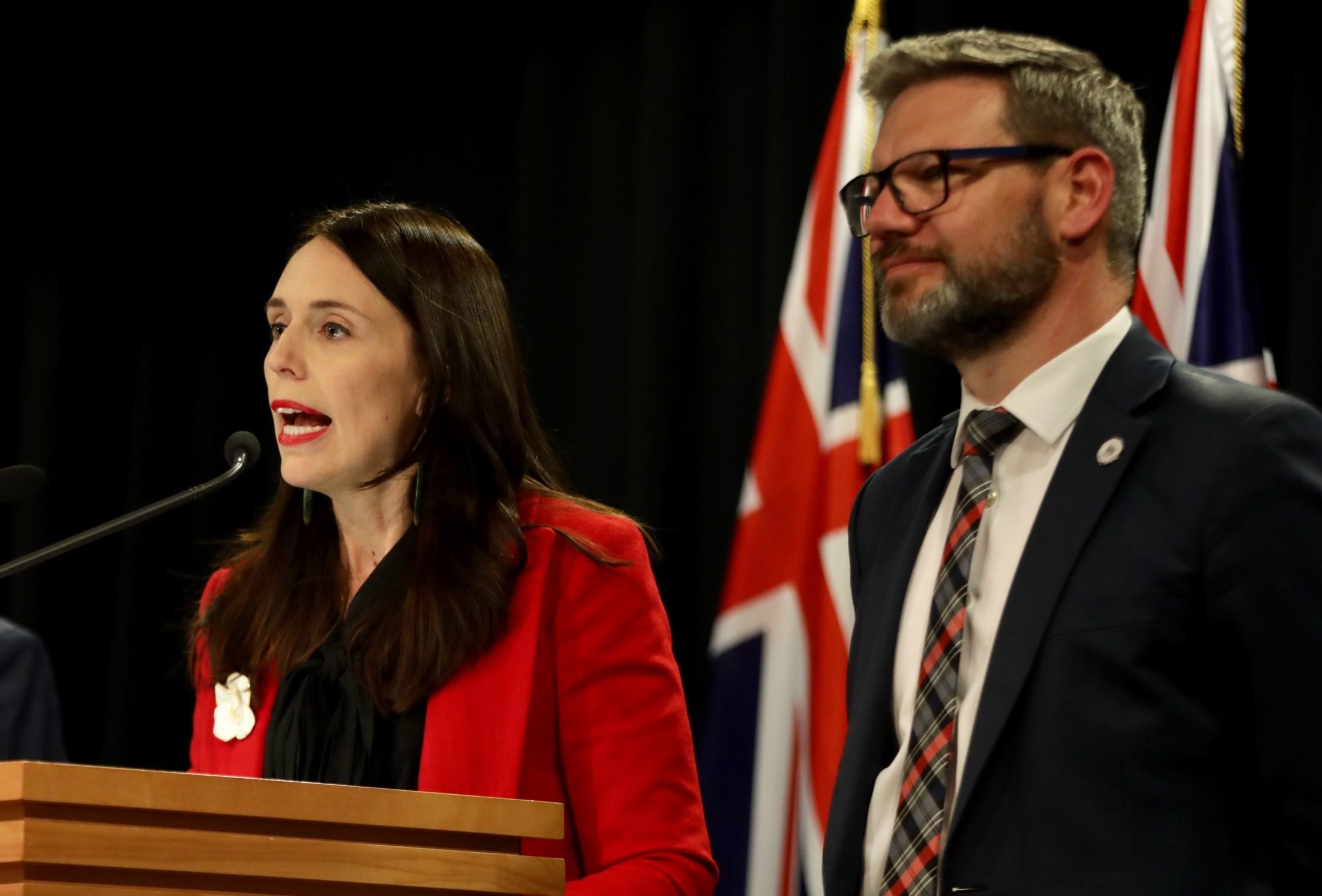 Prime Minister Jacinda Ardern - flanked by deputy PM Winston Peters and Immigration Minister Iain Lees-Galloway - announces the increase in NZ's refugee quota.