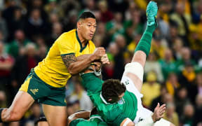 Wallabies fullback Israel Folau clashes with Ireland captain Peter O'Mahony