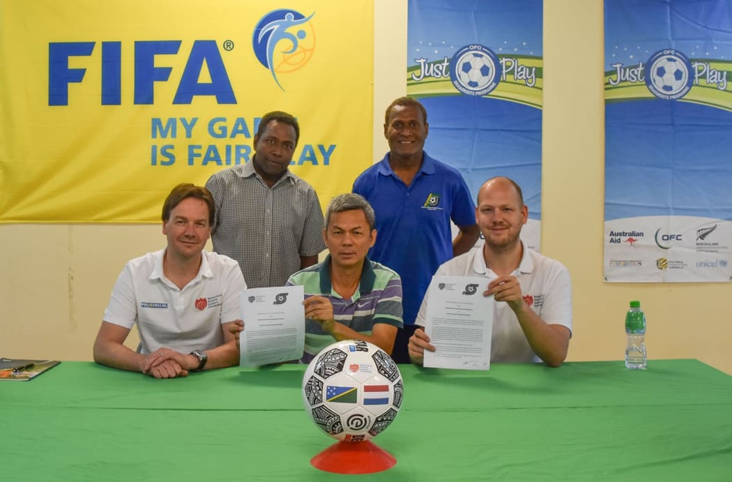 Solomon Islands Football Federation President William Lai (c).