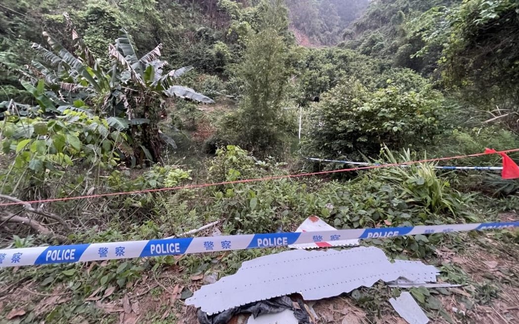 Pieces of a crashed passenger plane's wreckage found at the crash site in Tengxian County, in south China's Guangxi Zhuang Autonomous Region, March 22, 2022.